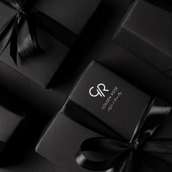 Golden Rose make up cadeauverpakking met zwart lint en producten